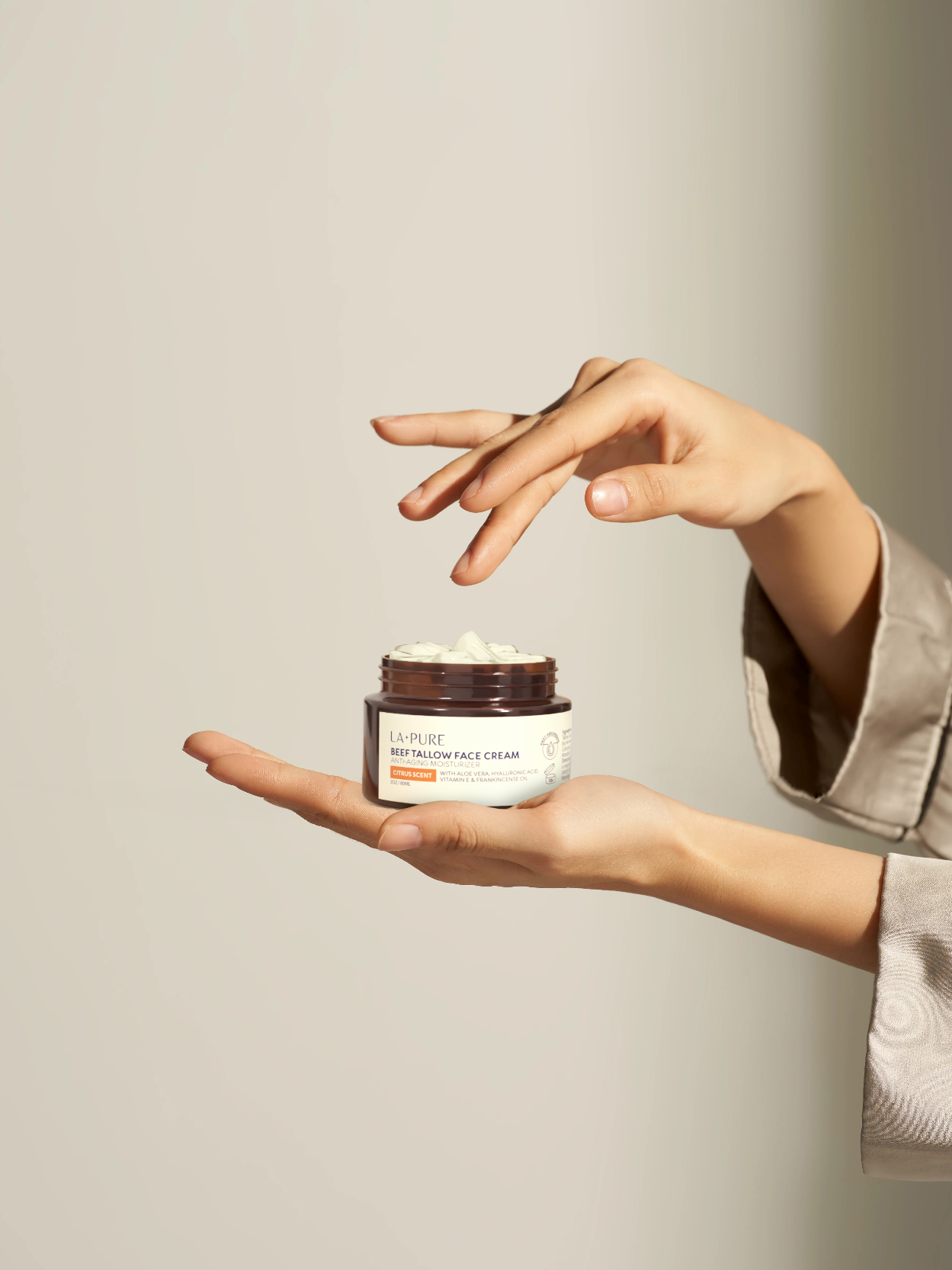 Woman holding Beef Tallow